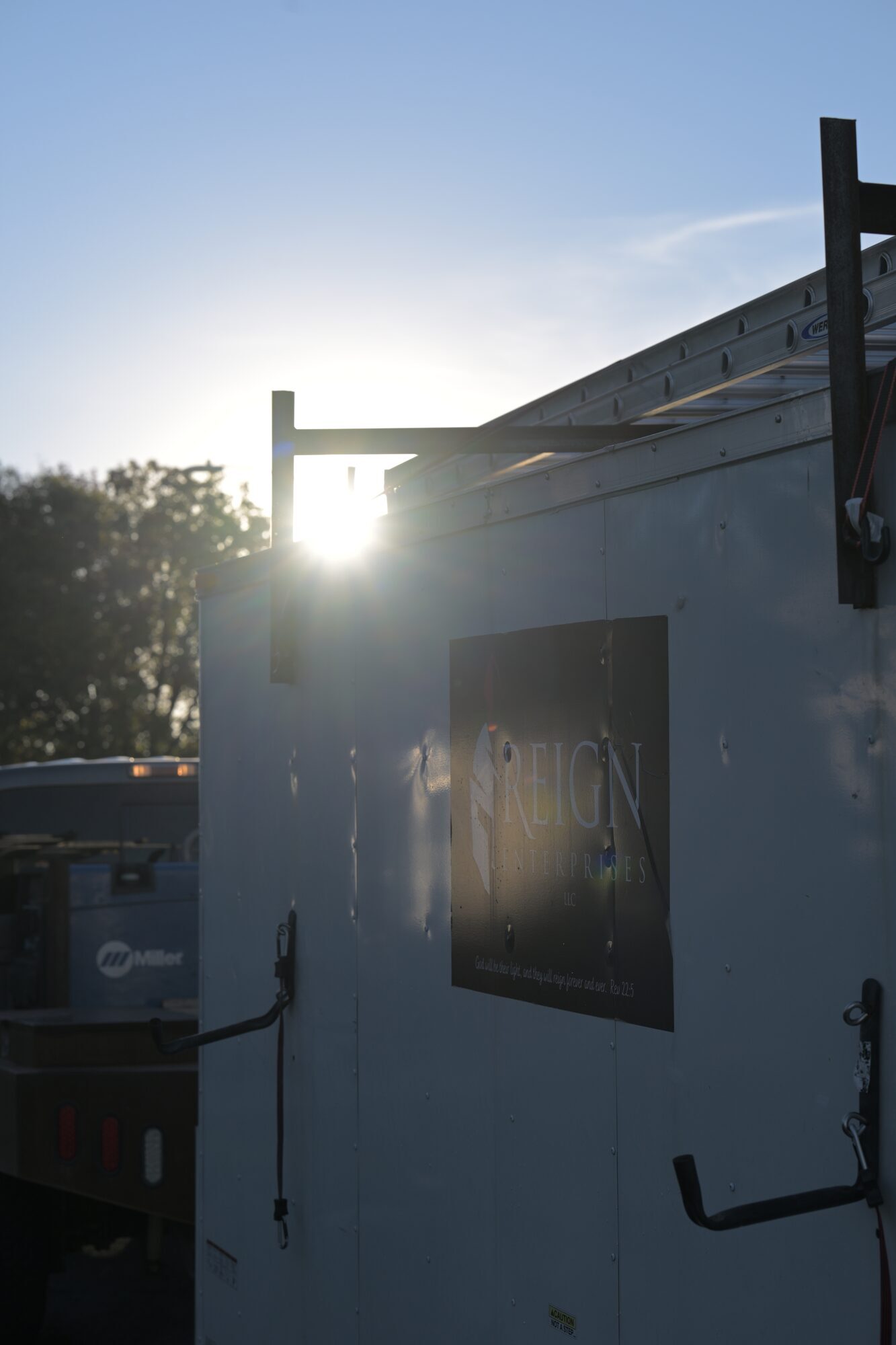 Reign Enterprises work trailer at sunrise